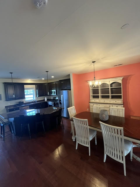 2212 Rising Hill Road Whitehall, PA 18052 - Photo 21 of 21 An open floor plan seamlessly connects the kitchen with a spacious dining area.
