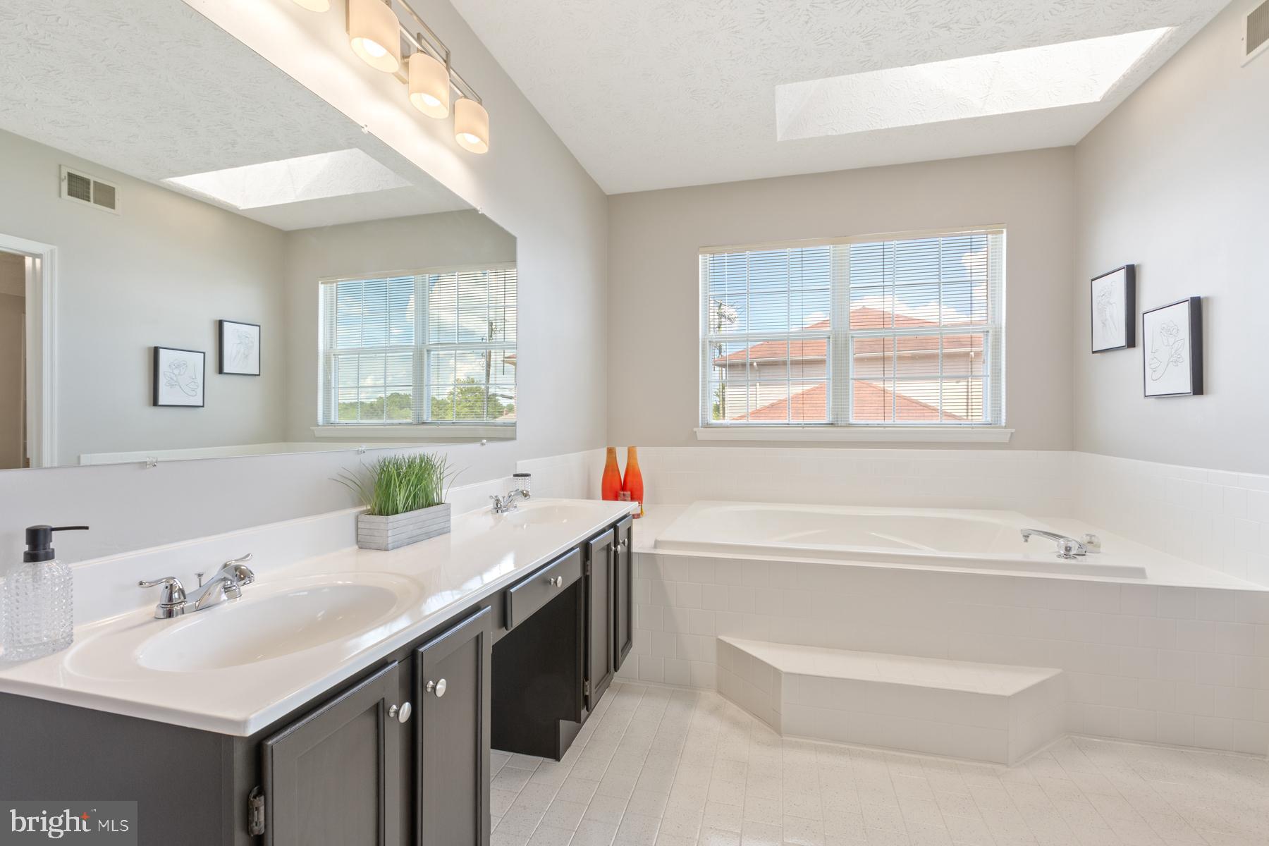 8915 Santeetlah Road Clinton, MD 20735 - Photo 28 of 41 Double vanity w/soak tub - Skylight