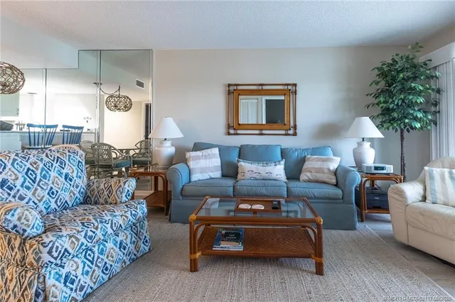 a kitchen with sink refrigerator and microwave
