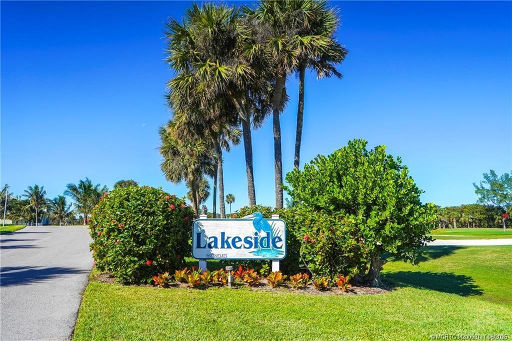 5596 Northeast Gulfstream Way Stuart, FL 34996 - Photo 9 of 21 a sign that is sitting in front of a building