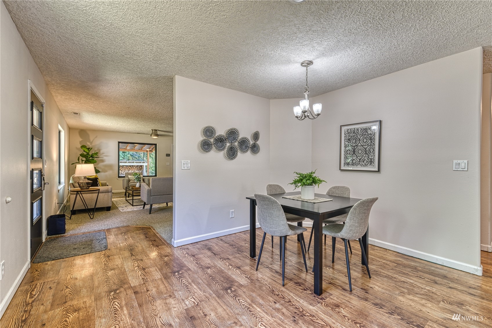 325 Hawkins Road Winlock, WA 98596 - Photo 11 of 40 a living room with furniture and a table