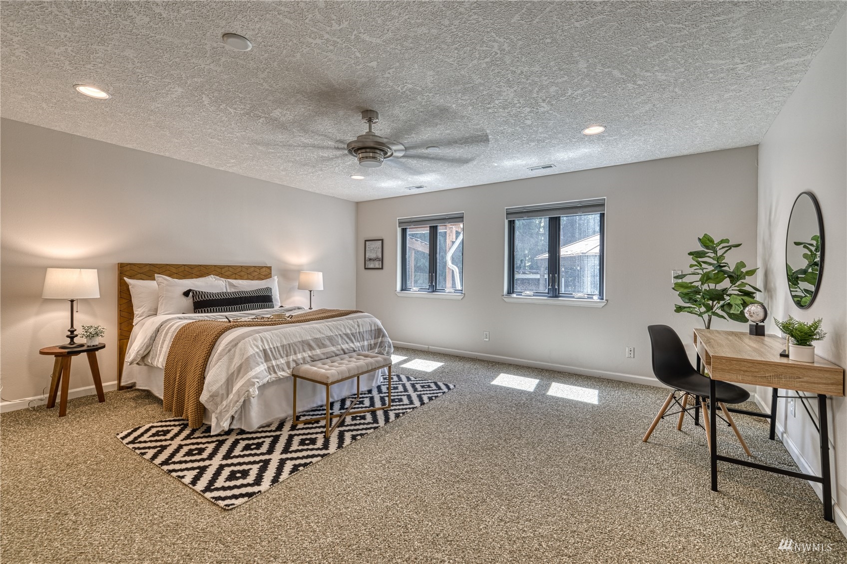 325 Hawkins Road Winlock, WA 98596 - Photo 15 of 40 a bedroom with a bed and a table in it