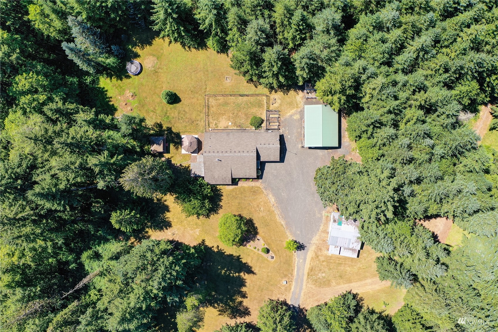 325 Hawkins Road Winlock, WA 98596 - Photo 2 of 40 an aerial view of a house with a yard