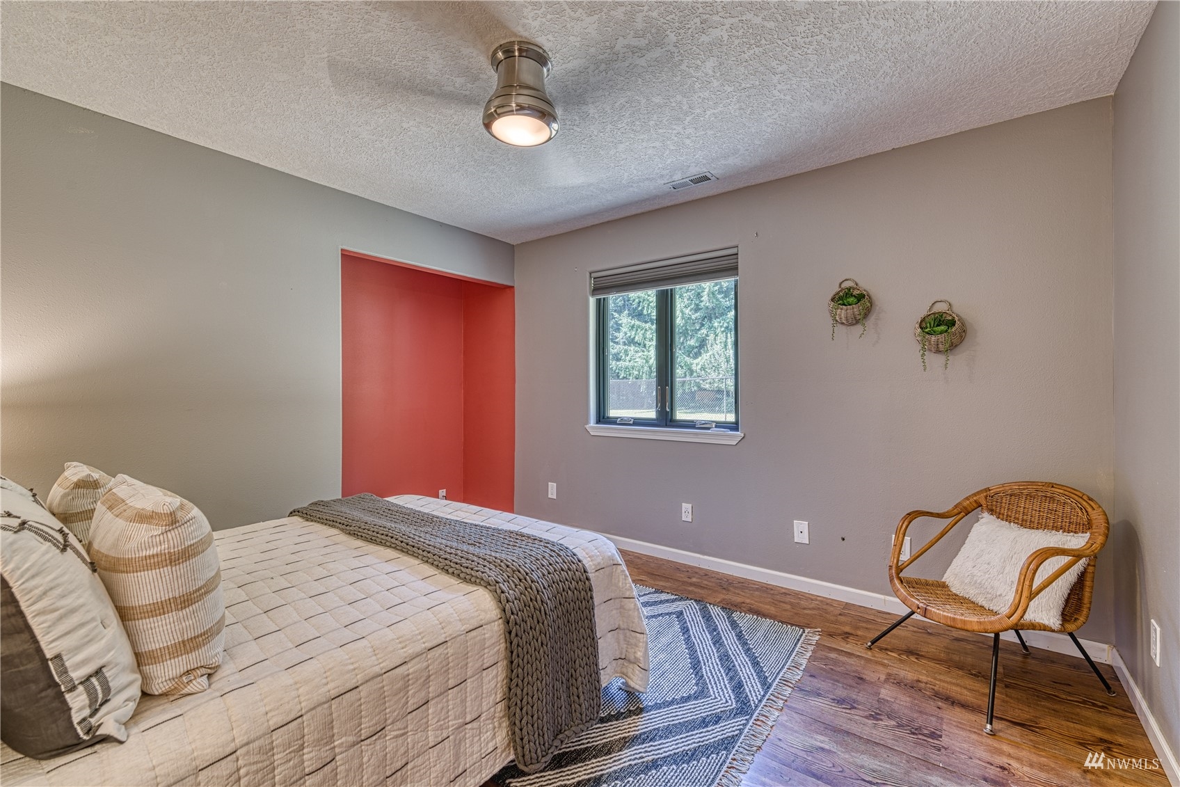 325 Hawkins Road Winlock, WA 98596 - Photo 22 of 40 a bedroom with a bed chair and window
