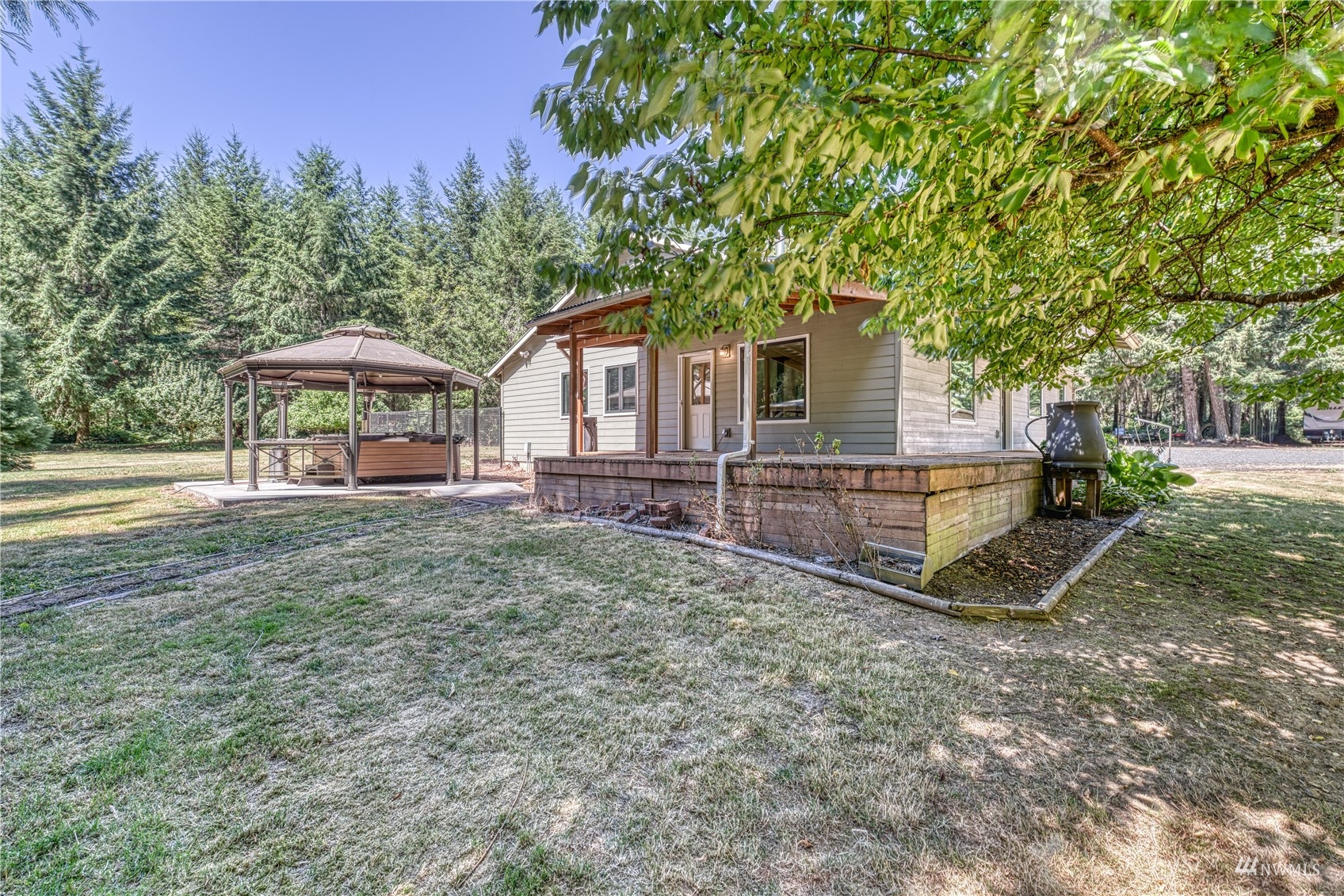 325 Hawkins Road Winlock, WA 98596 - Photo 29 of 40 a view of a house with a yard and sitting area