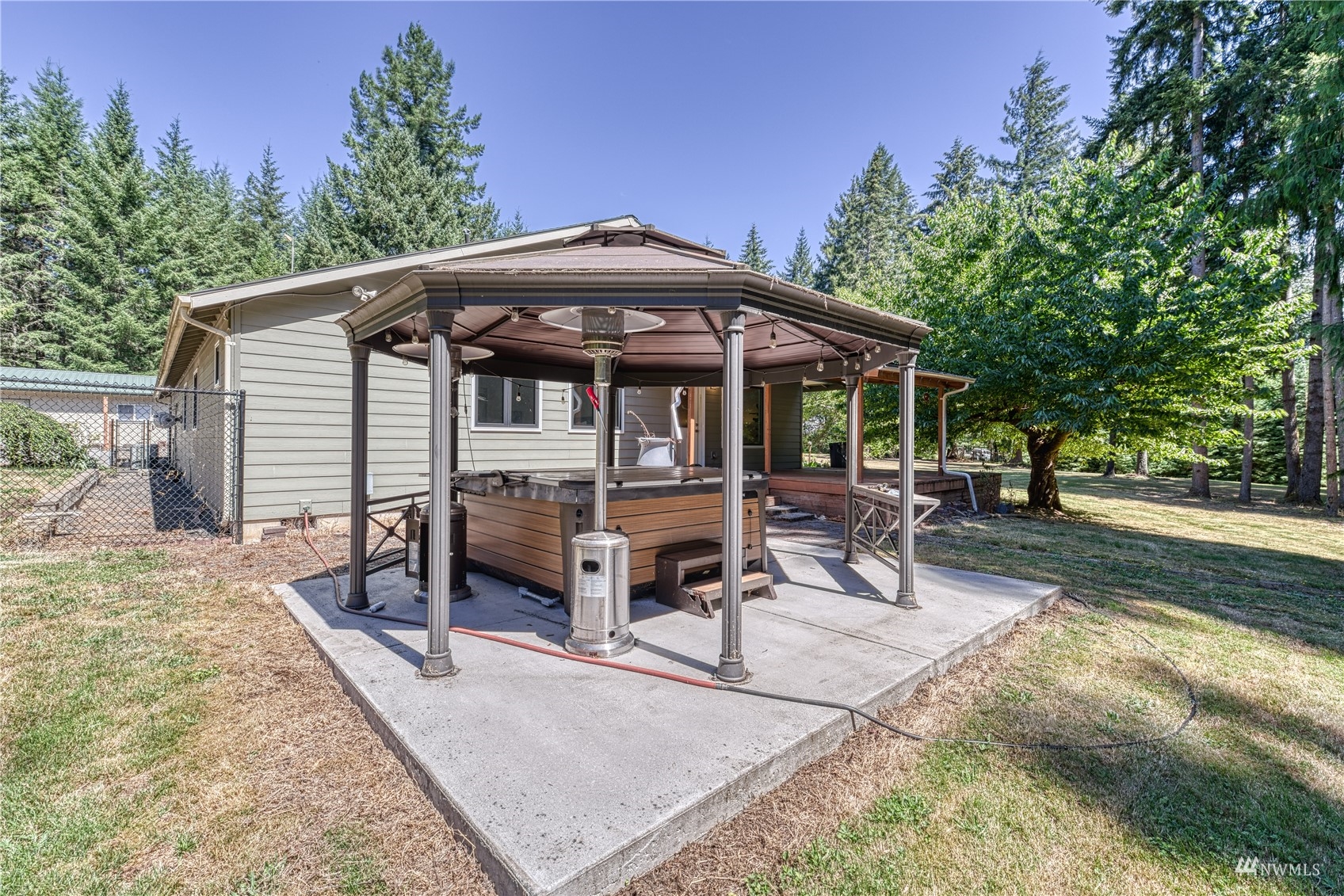 325 Hawkins Road Winlock, WA 98596 - Photo 31 of 40 a view of a house with backyard and sitting area
