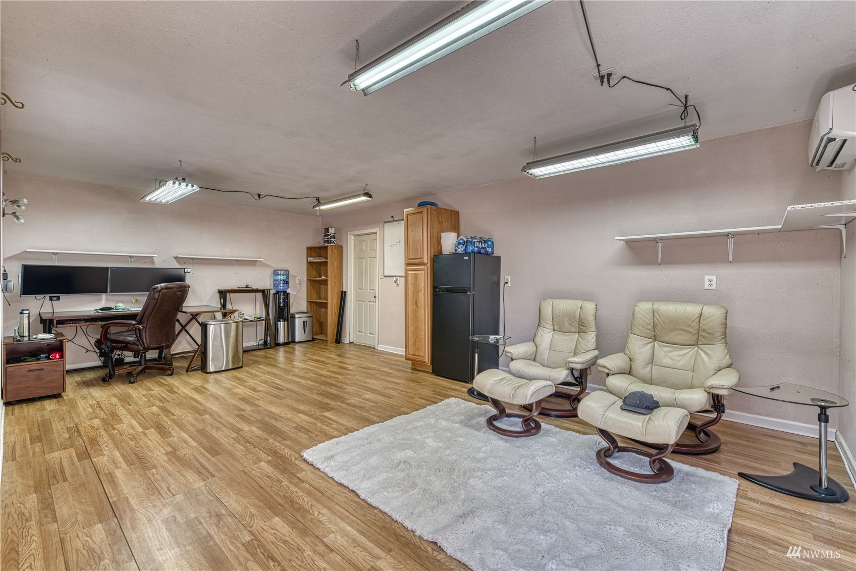 325 Hawkins Road Winlock, WA 98596 - Photo 33 of 40 a living room with lots of furniture and a wooden floor