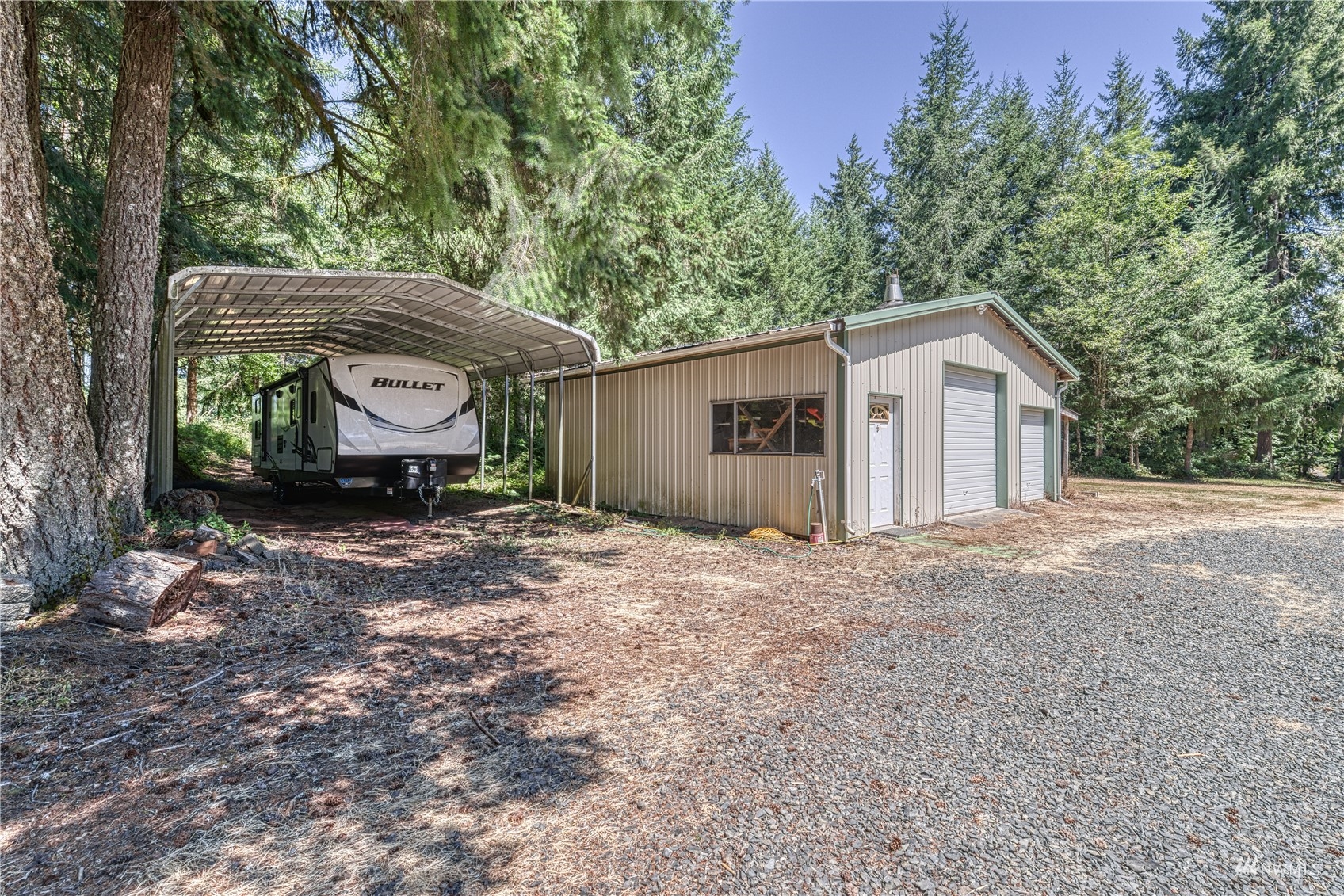 325 Hawkins Road Winlock, WA 98596 - Photo 36 of 40 a view of a house with backyard and trees