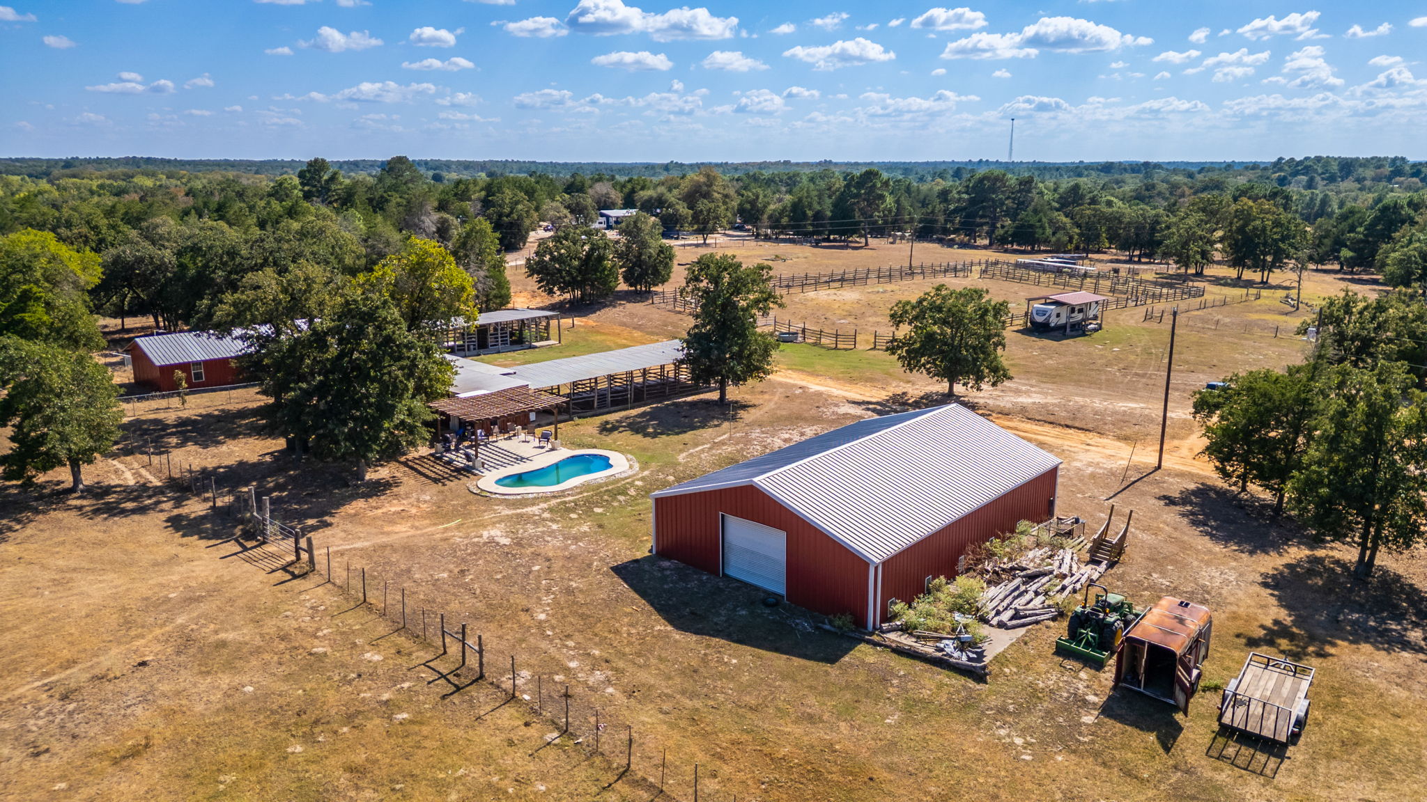 274 Old Potato Road Paige, TX 78659 - Photo 20 of 39 View of rural area featuring a pool area
