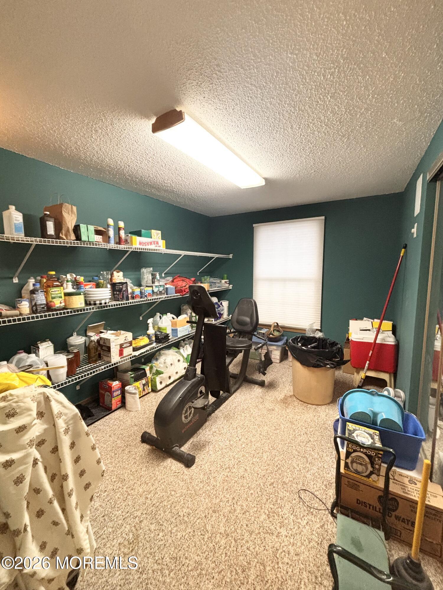 896 Anderson Road Jackson, NJ 08527 - Photo 11 of 21 a room with lots of chairs and toys