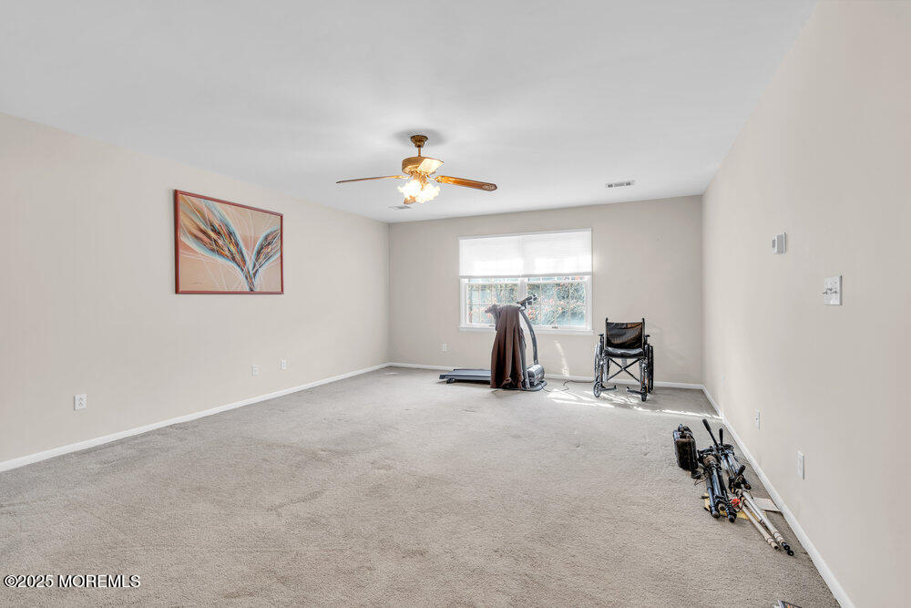 896 Anderson Road Jackson, NJ 08527 - Photo 14 of 21 an empty room with windows and closet