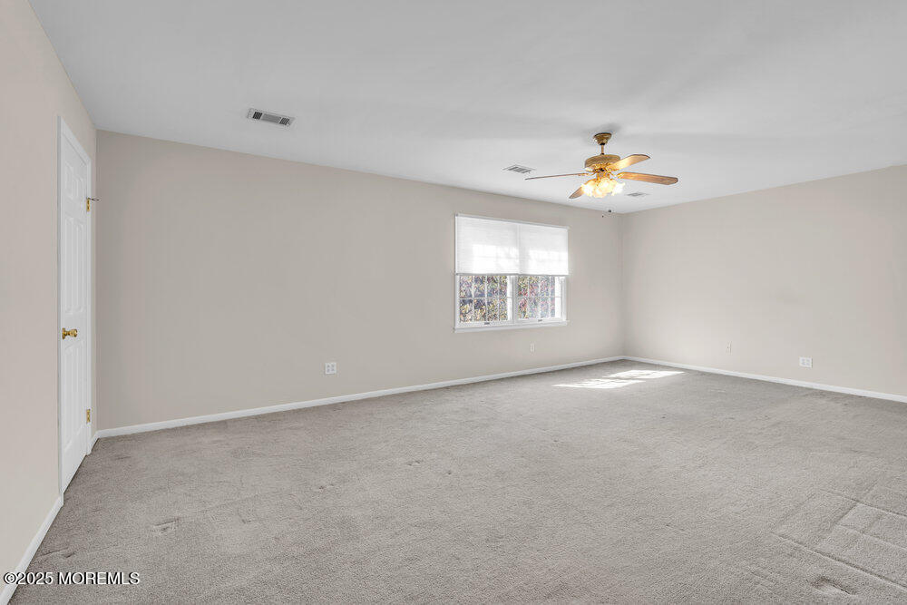 896 Anderson Road Jackson, NJ 08527 - Photo 17 of 21 an empty room with a window