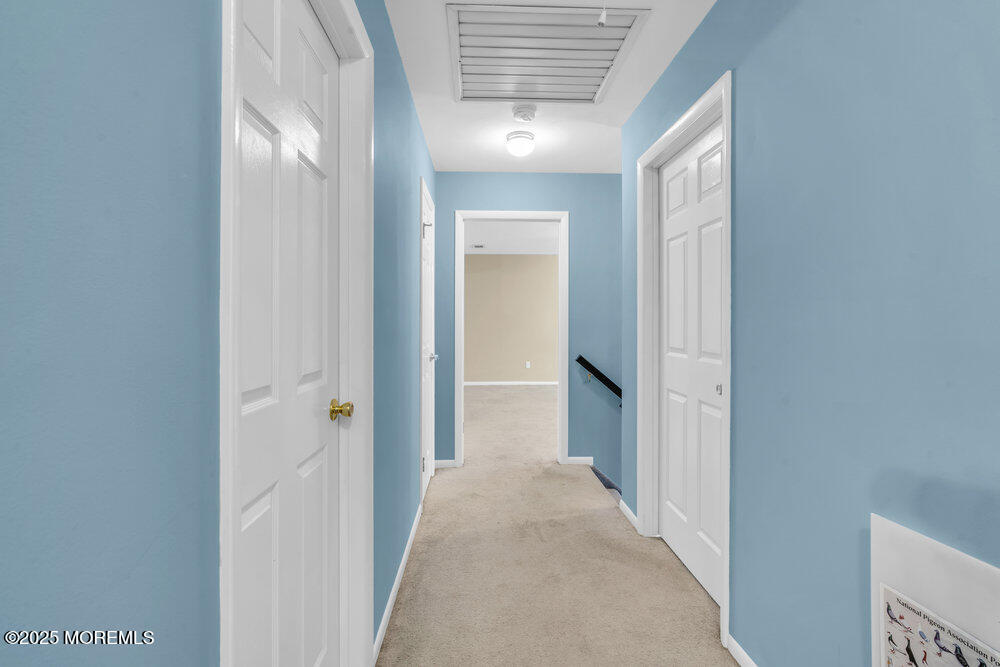 896 Anderson Road Jackson, NJ 08527 - Photo 19 of 21 a view of a hallway with wooden floor