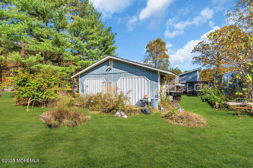 896 Anderson Road Jackson, NJ 08527 - Photo 21 of 21 a front view of a house with garden