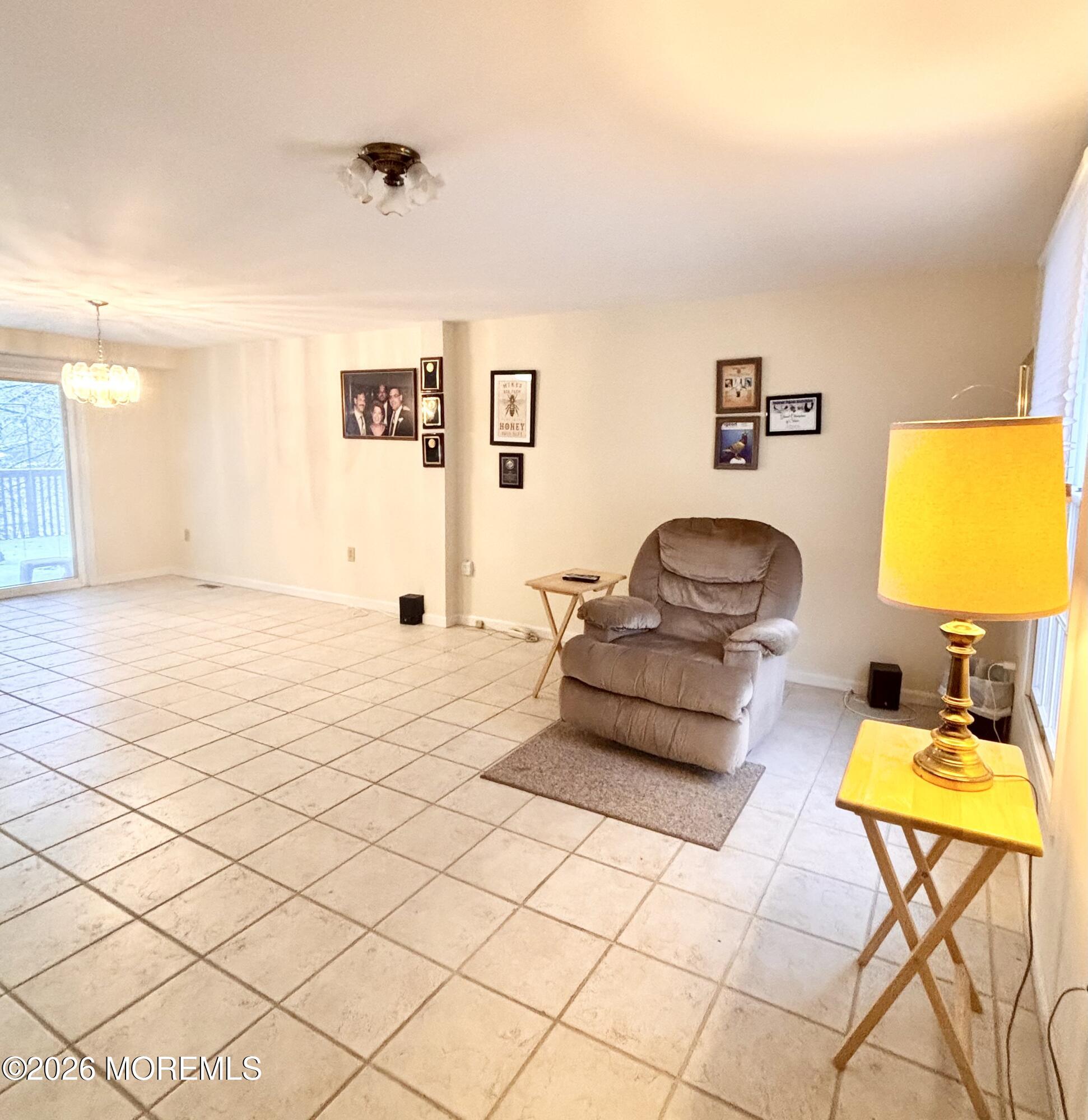 896 Anderson Road Jackson, NJ 08527 - Photo 4 of 21 a living room with a couch and a couch