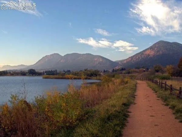 an aerial view of a house with a lake view
