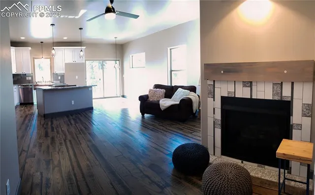 a bedroom with a bed and a fireplace