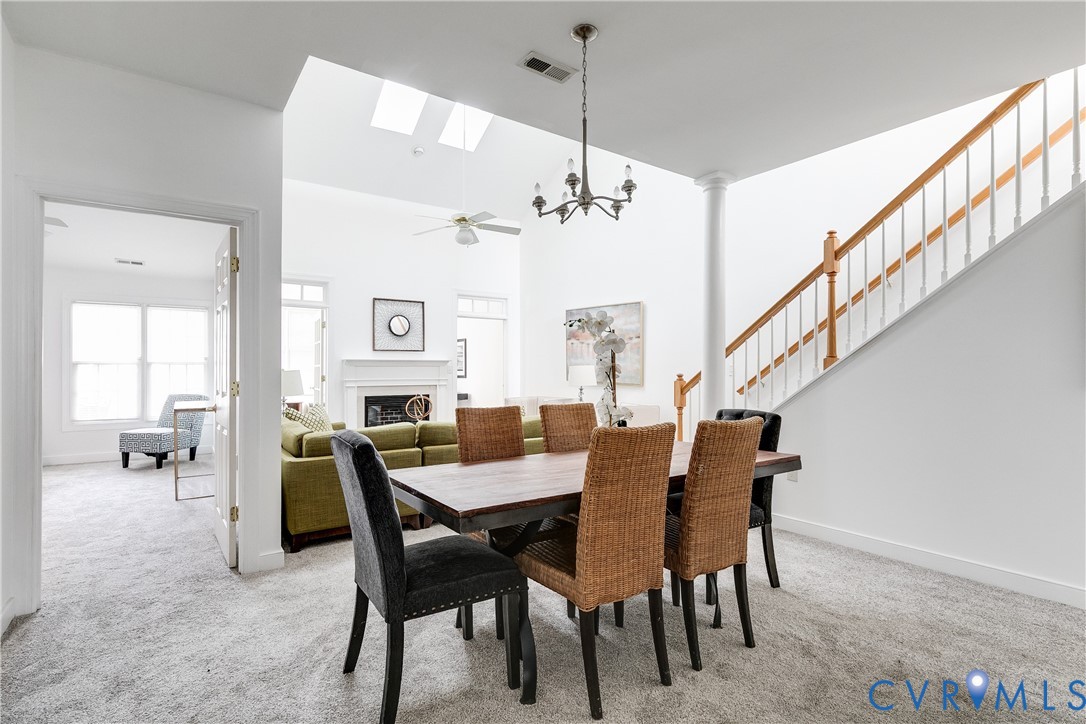 2209 Magnolia Grove Way Midlothian, VA 23113 - Photo 16 of 50 a view of a dining room with furniture