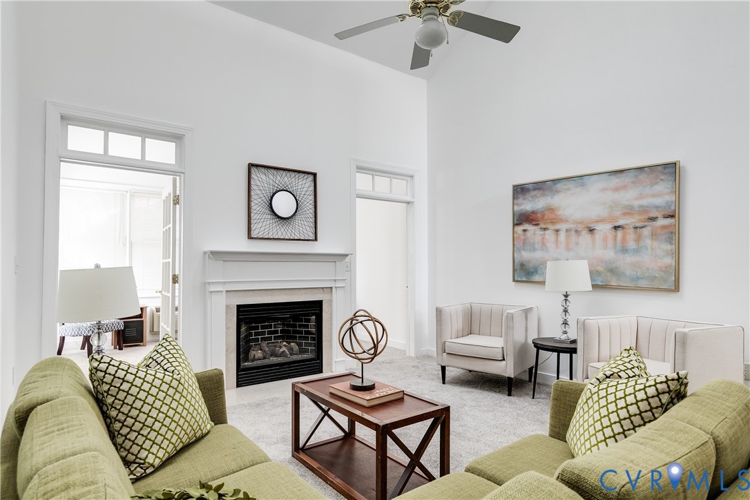 2209 Magnolia Grove Way Midlothian, VA 23113 - Photo 22 of 50 a living room with furniture and a fireplace