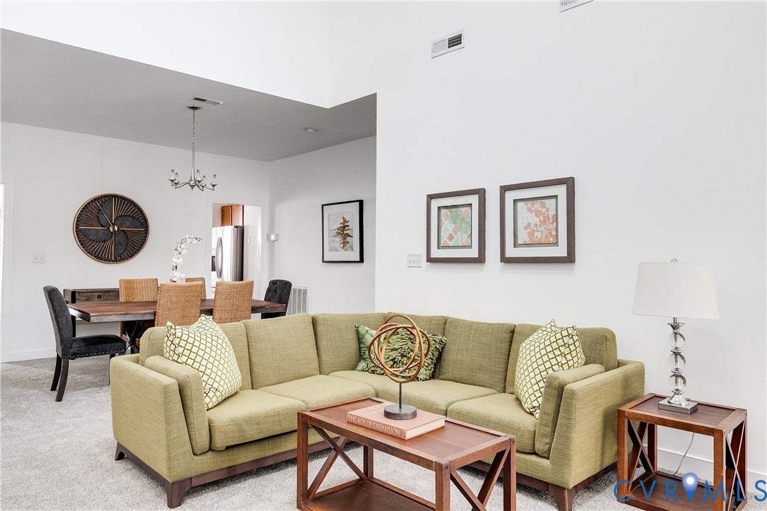 2209 Magnolia Grove Way Midlothian, VA 23113 - Photo 24 of 50 a view of a livingroom with furniture and window