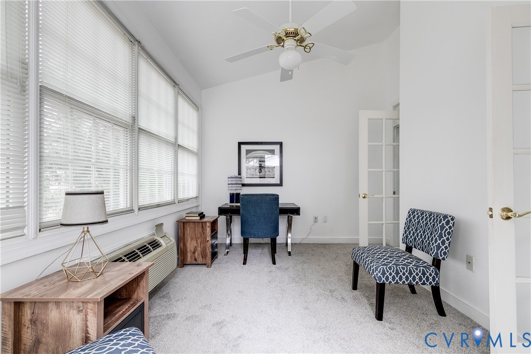 2209 Magnolia Grove Way Midlothian, VA 23113 - Photo 27 of 50 a living room with furniture and a chair