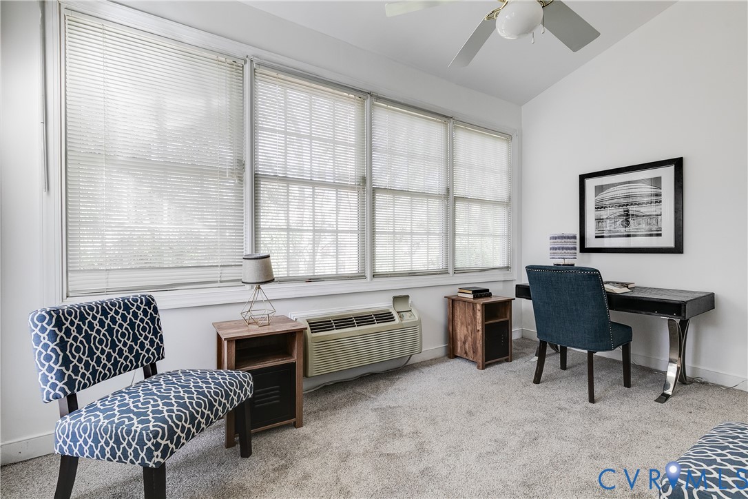 2209 Magnolia Grove Way Midlothian, VA 23113 - Photo 28 of 50 a kitchen with a window dining table and chairs