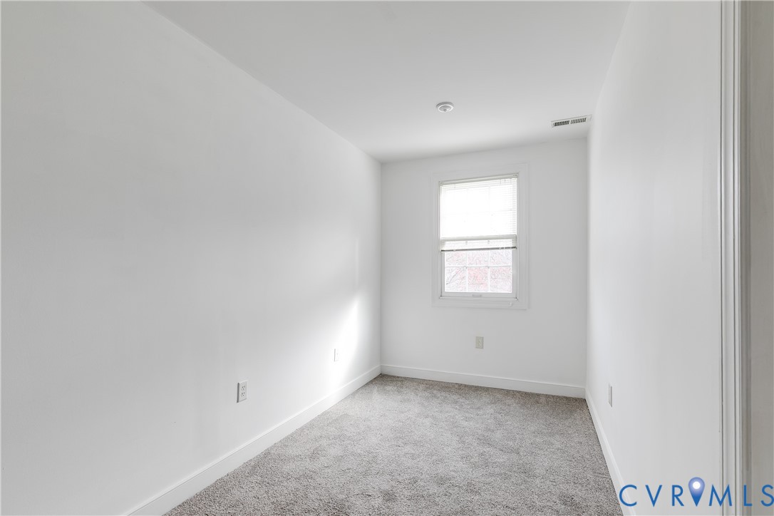 2209 Magnolia Grove Way Midlothian, VA 23113 - Photo 42 of 50 an empty room with a window