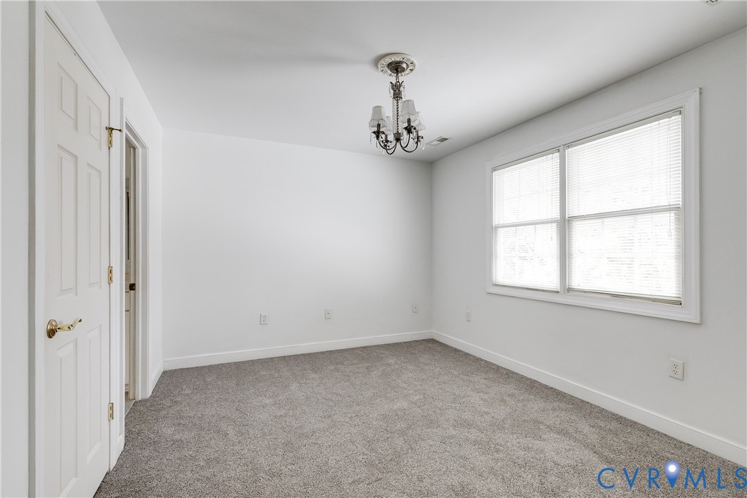 2209 Magnolia Grove Way Midlothian, VA 23113 - Photo 47 of 50 wooden floor in an empty room with a window