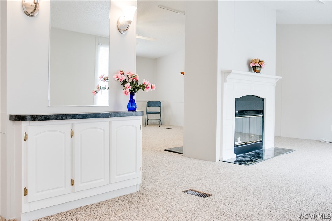 3464 Cedar Plains Road Sandy Hook, VA 23153 - Photo 41 of 43 a view of a livingroom with a fireplace