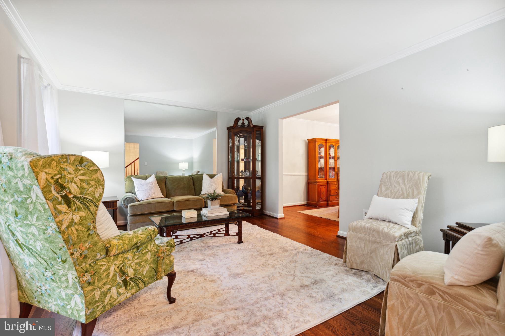 5124 Pheasant Ridge Road Fairfax, VA 22030 - Photo 16 of 53 Sunlit living room overlooking expansive yard