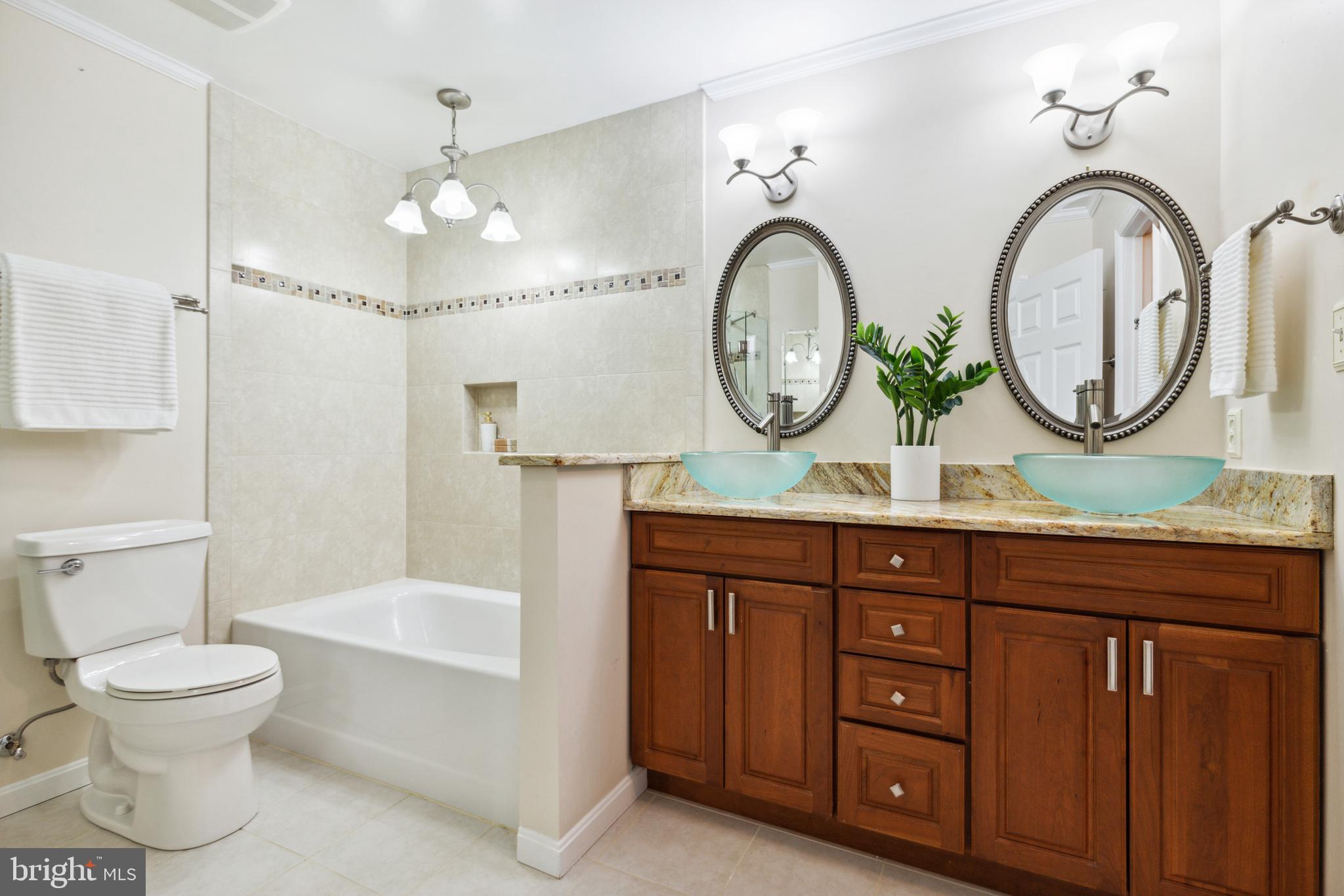 5124 Pheasant Ridge Road Fairfax, VA 22030 - Photo 22 of 53 Updated bath w/ double vanity & walk-in closet