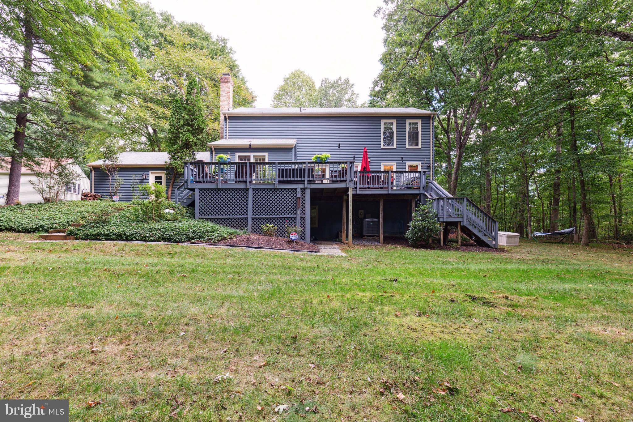 5124 Pheasant Ridge Road Fairfax, VA 22030 - Photo 44 of 53 Full Trex deck w/ 2 stairways on back of house