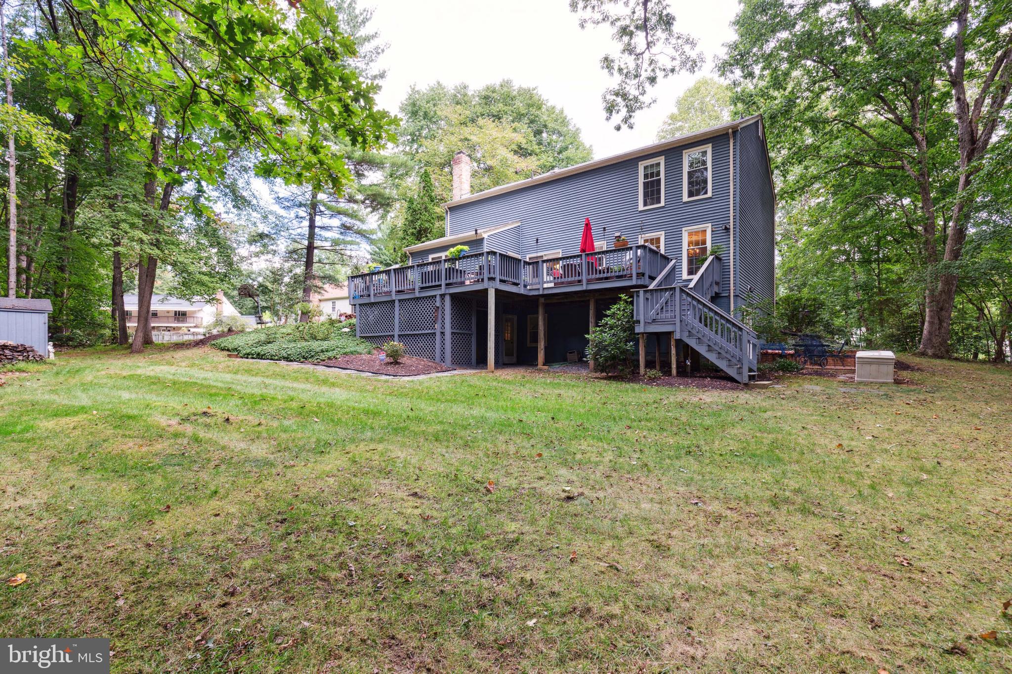 5124 Pheasant Ridge Road Fairfax, VA 22030 - Photo 49 of 53 Large, flat backyard backing to treed parkland