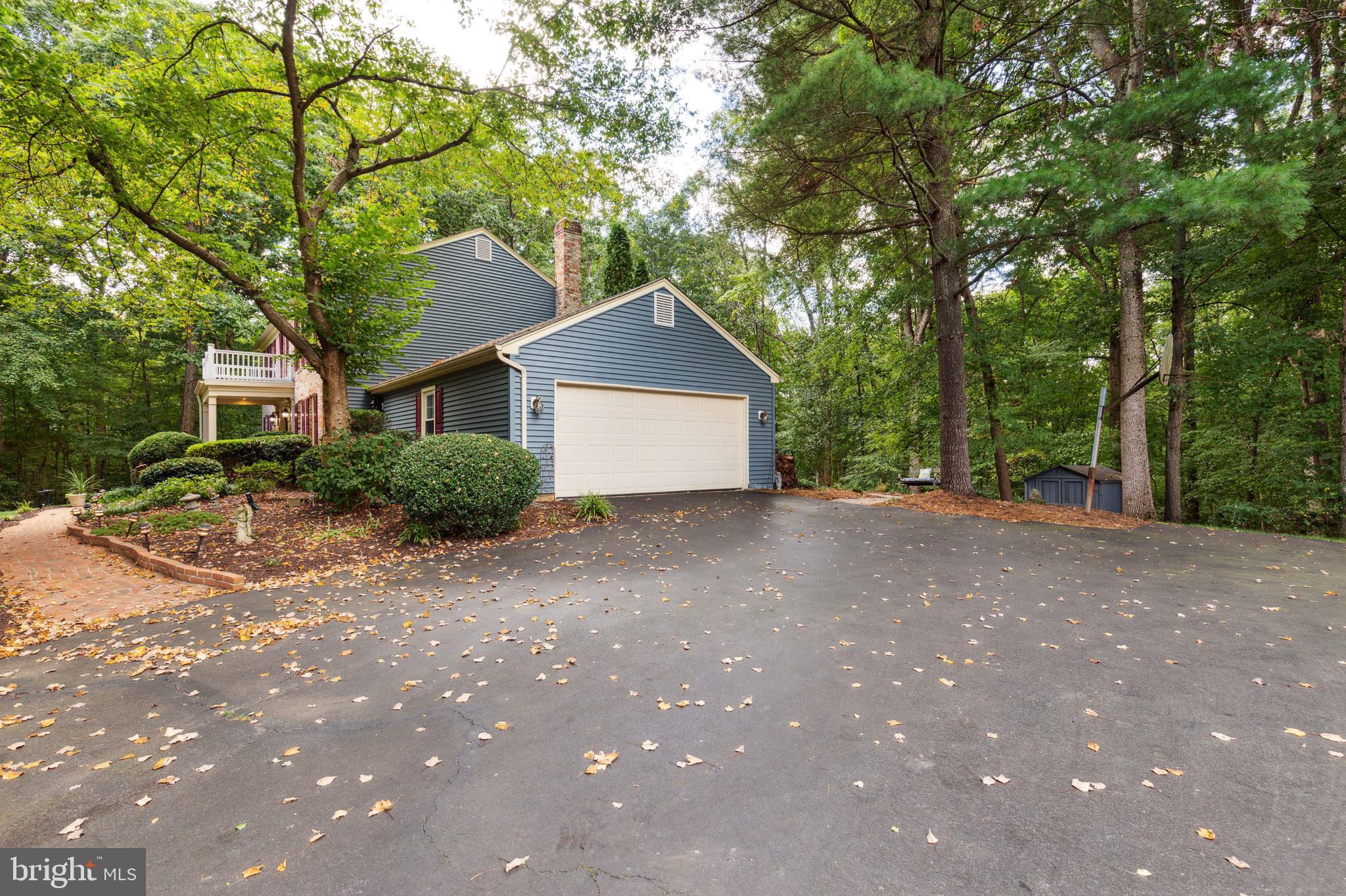 5124 Pheasant Ridge Road Fairfax, VA 22030 - Photo 50 of 53 Side-entry, two-car garage w/ extra parking