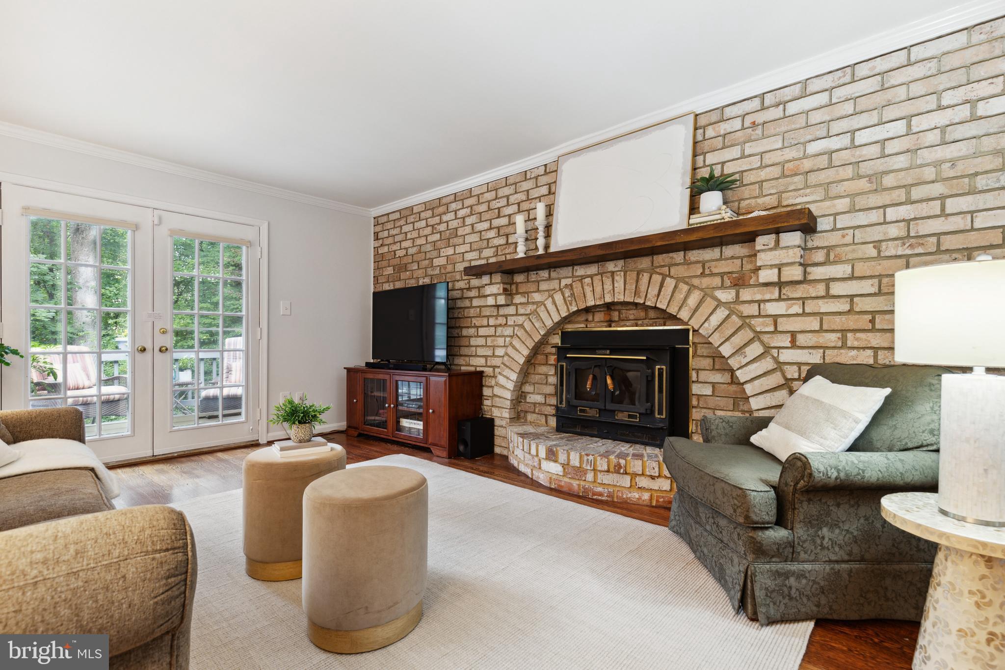 5124 Pheasant Ridge Road Fairfax, VA 22030 - Photo 7 of 53 Wood-burning fireplace showcases the family room