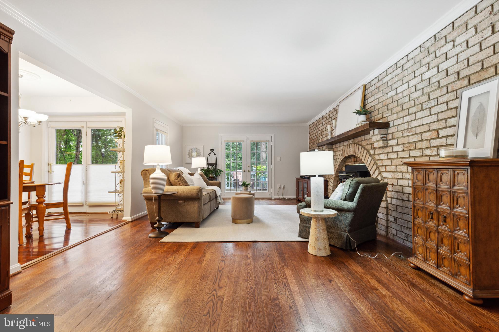 5124 Pheasant Ridge Road Fairfax, VA 22030 - Photo 8 of 53 Family room w/ fireplace and 2 deck access points