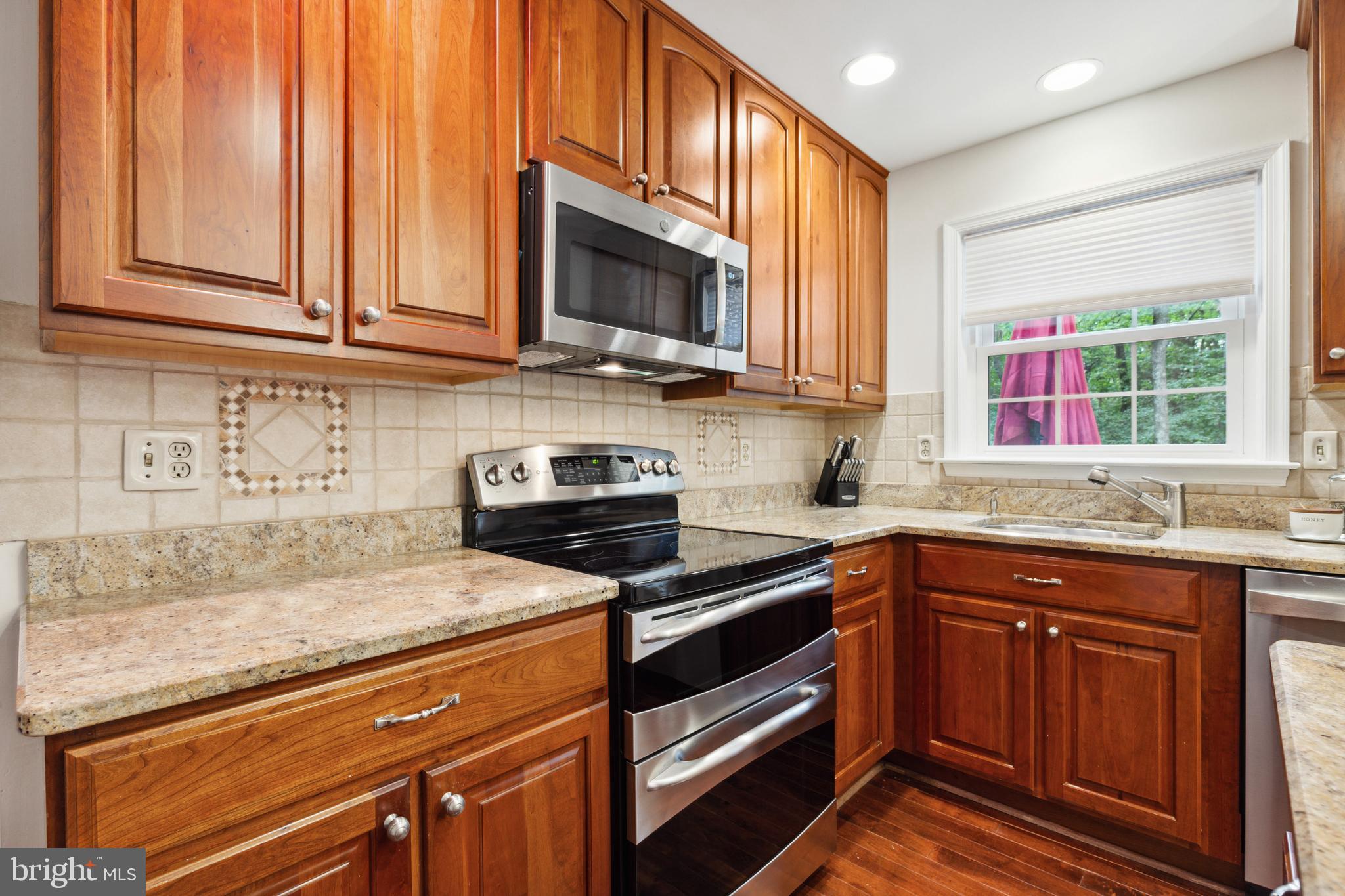 5124 Pheasant Ridge Road Fairfax, VA 22030 - Photo 10 of 53 Stainless-steel appliances and recessed lighting