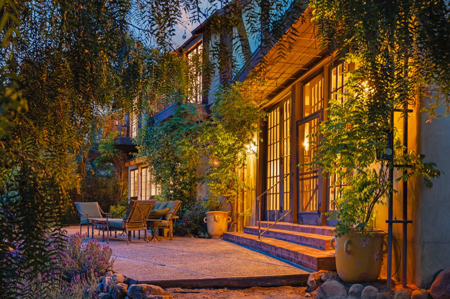 520 Foothill Road Ojai, CA 93023 - Photo 39 of 45 a backyard of a house with table and chairs
