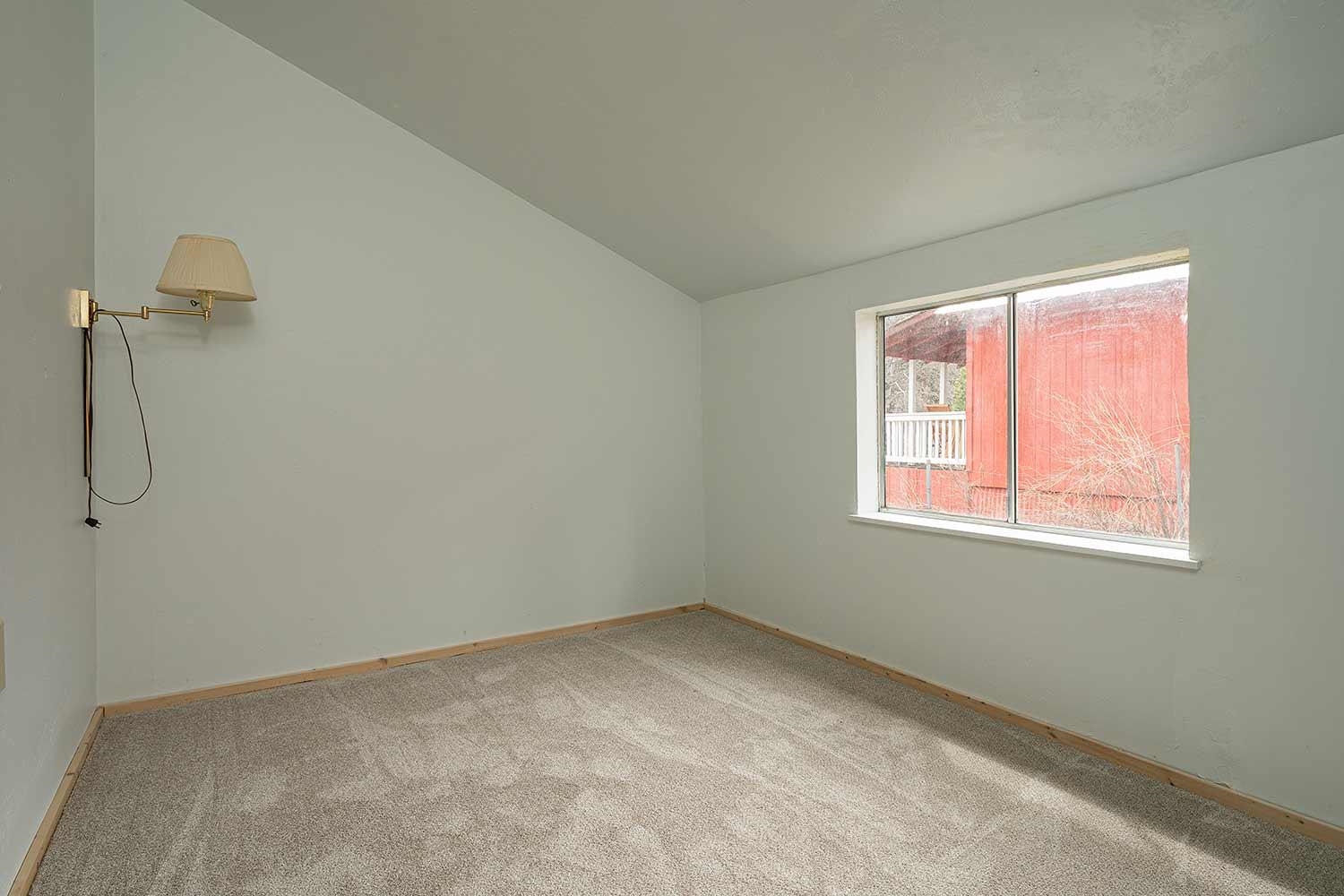 318 Coates Avenue Calpine, CA 96124 - Photo 12 of 21 a view of a room that has a window in it