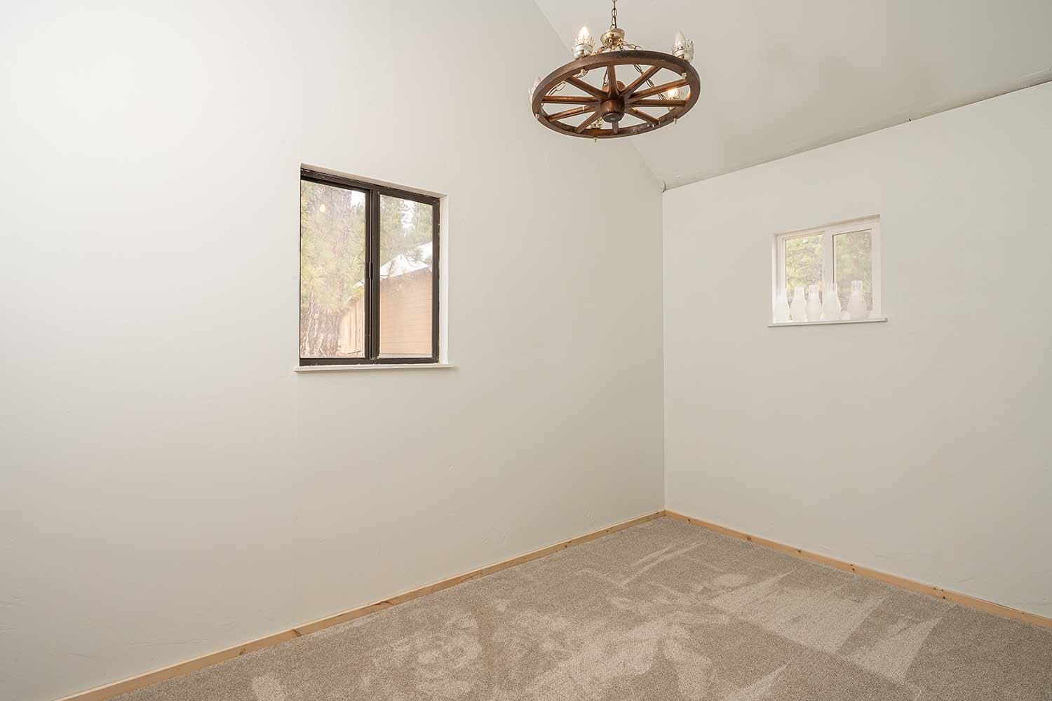 318 Coates Avenue Calpine, CA 96124 - Photo 14 of 21 an empty room with a window