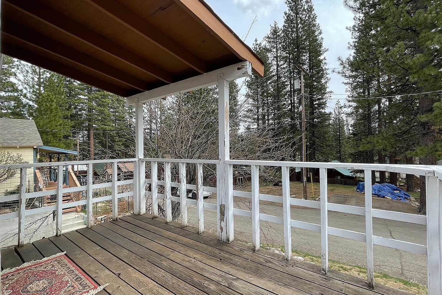 318 Coates Avenue Calpine, CA 96124 - Photo 3 of 21 a view of a balcony with wooden floor