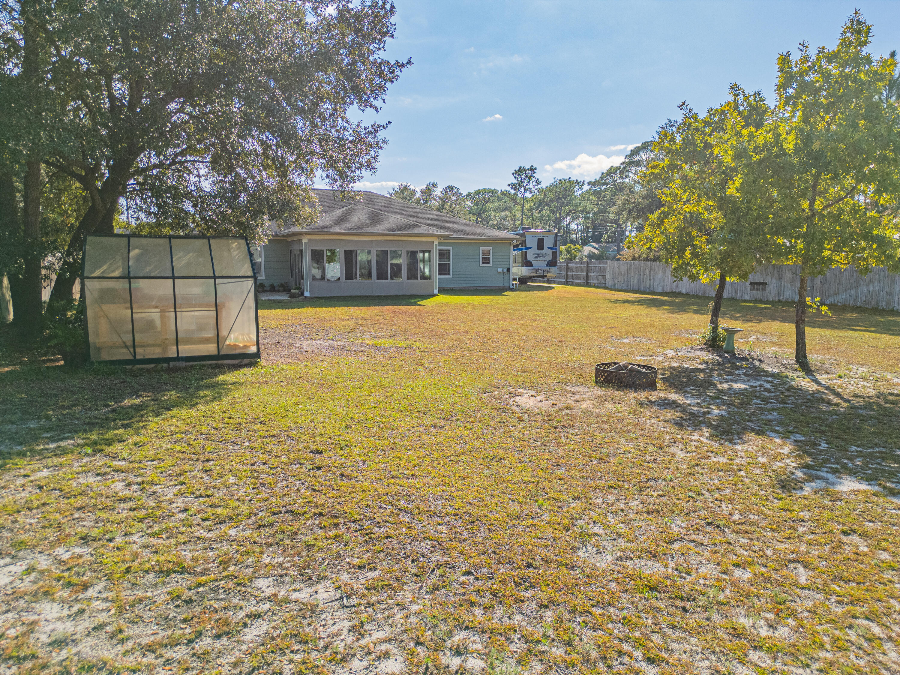 8686 El Paseo Street Navarre, FL 32566 - Photo 32 of 39 a view of an ocean beach
