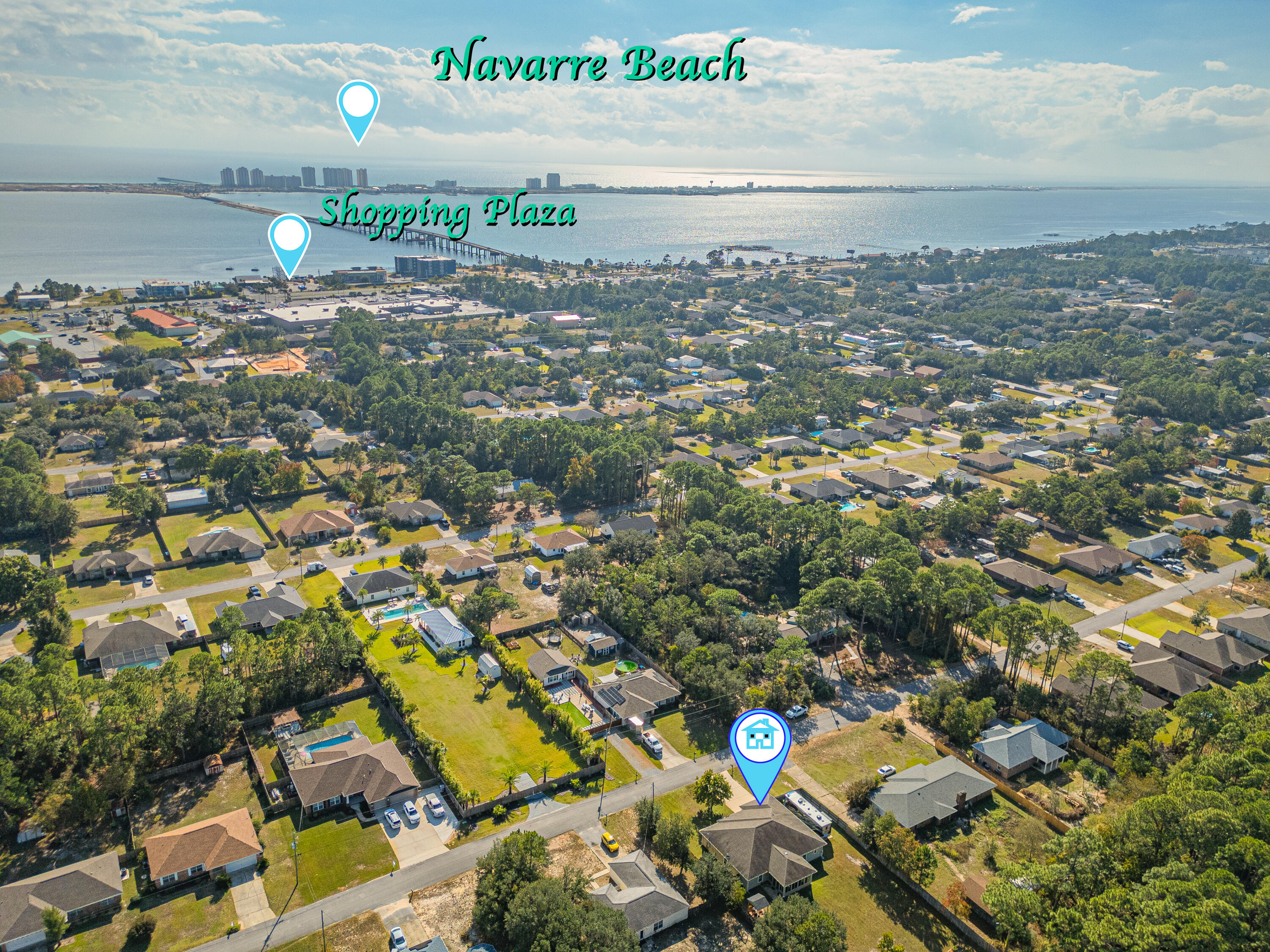8686 El Paseo Street Navarre, FL 32566 - Photo 37 of 39 an aerial view of a city