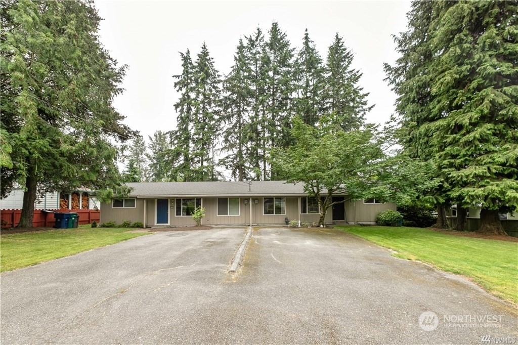 130 Bellflower Road Bothell, WA 98012 - Photo 3 of 25 a view of house with a yard