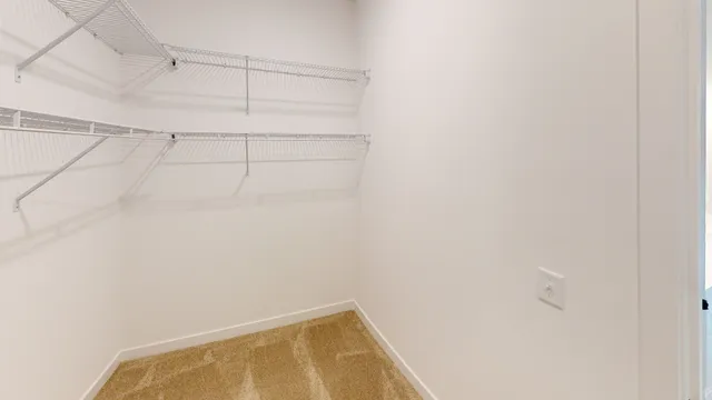 a view of a room with racks on the wall