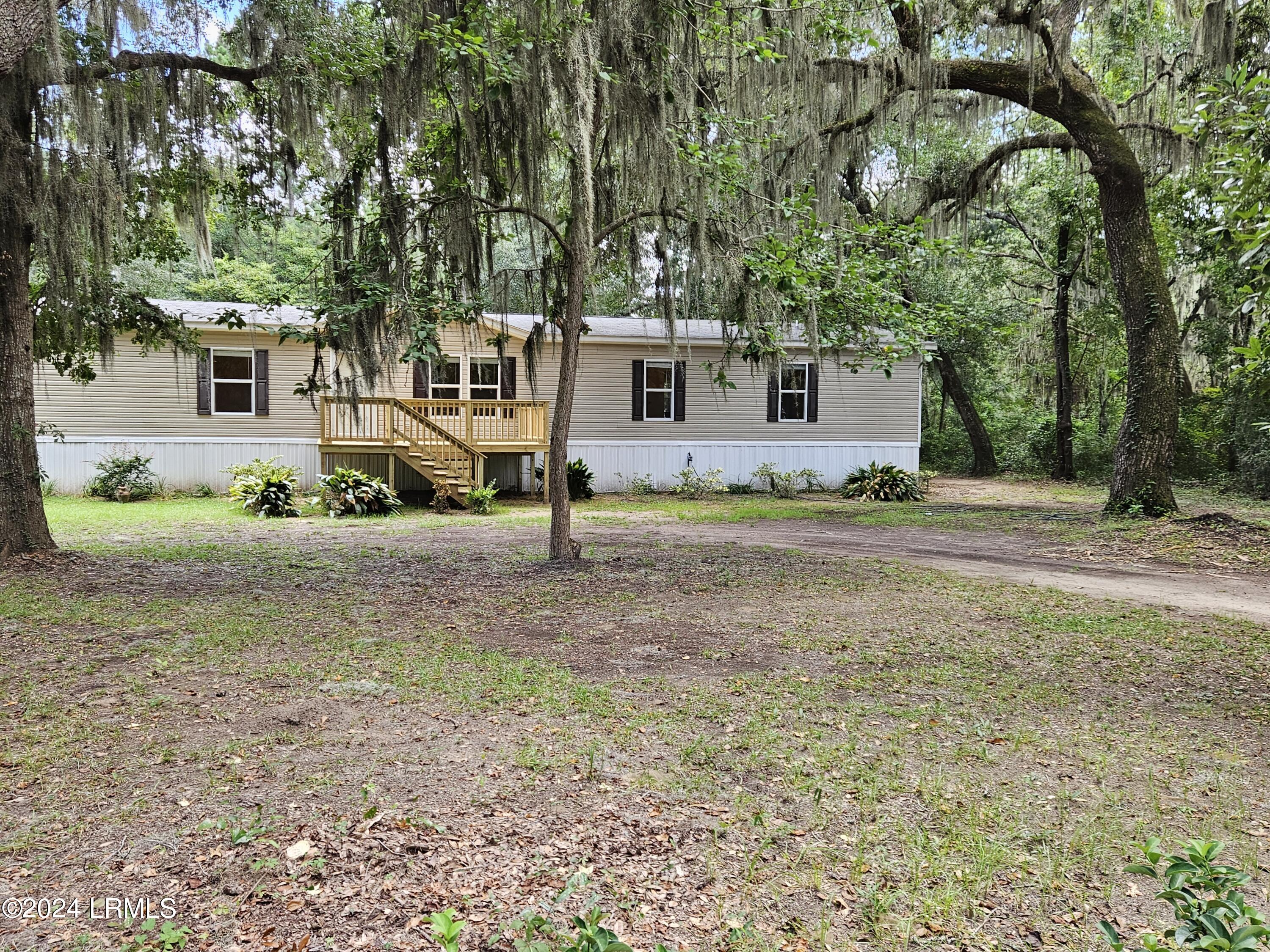 73 Seaside Road St. Helena Island, SC 29920 - Photo 2 of 40 r Front with Trees