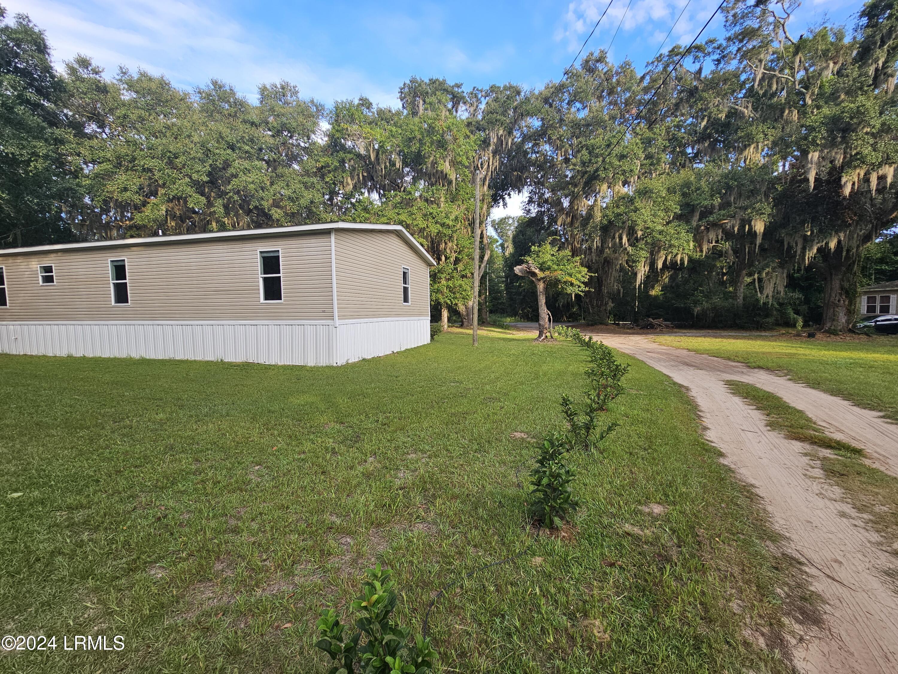 73 Seaside Road St. Helena Island, SC 29920 - Photo 32 of 40 s backyard 4