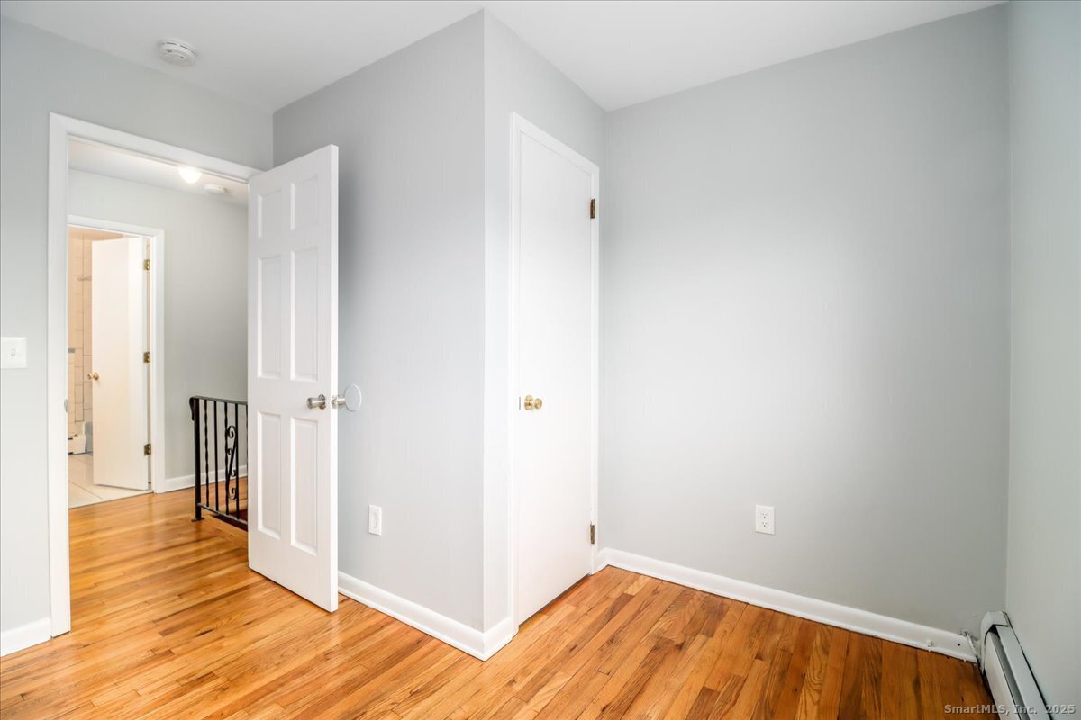 32 Pleasant Street Bethel, CT 06801 - Photo 23 of 29 a view of a room with wooden floor