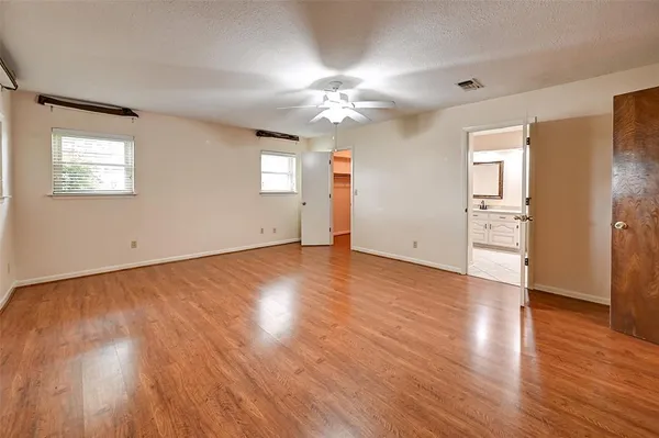 a bathroom with a double vanity sink and mirror