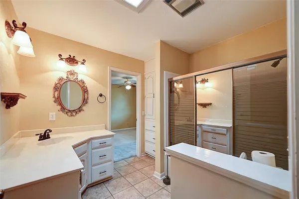 a view of a livingroom with furniture and a window